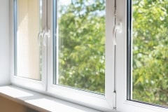 closed pvc window in room at apartment